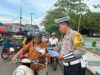 Ops Patuh Intan 2025: Satlantas Polres Batola Bagi Brosur Tertib Lalu Lintas di Simpang Marabahan IMG-20250716-WA0005